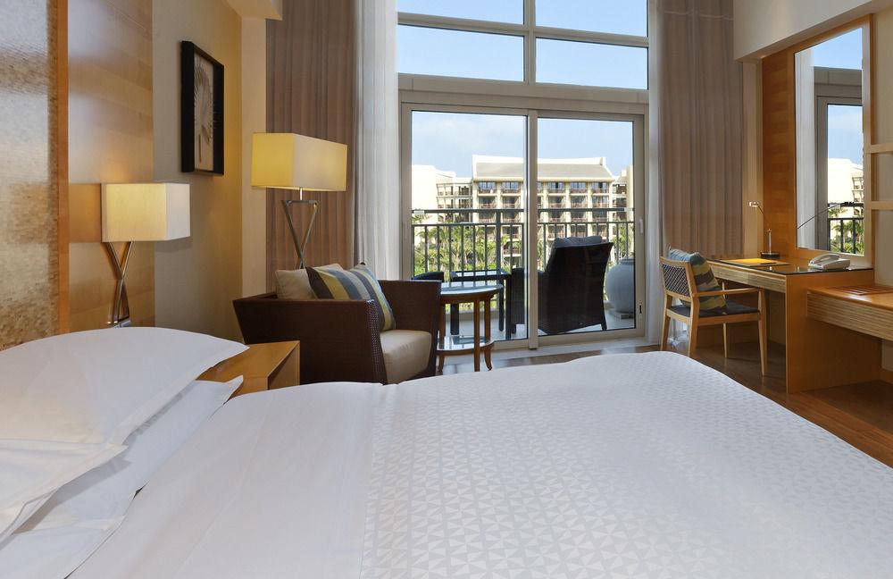 Four Points By Sheraton Shenzhou Peninsula Resort Wanning Exteriör bild
