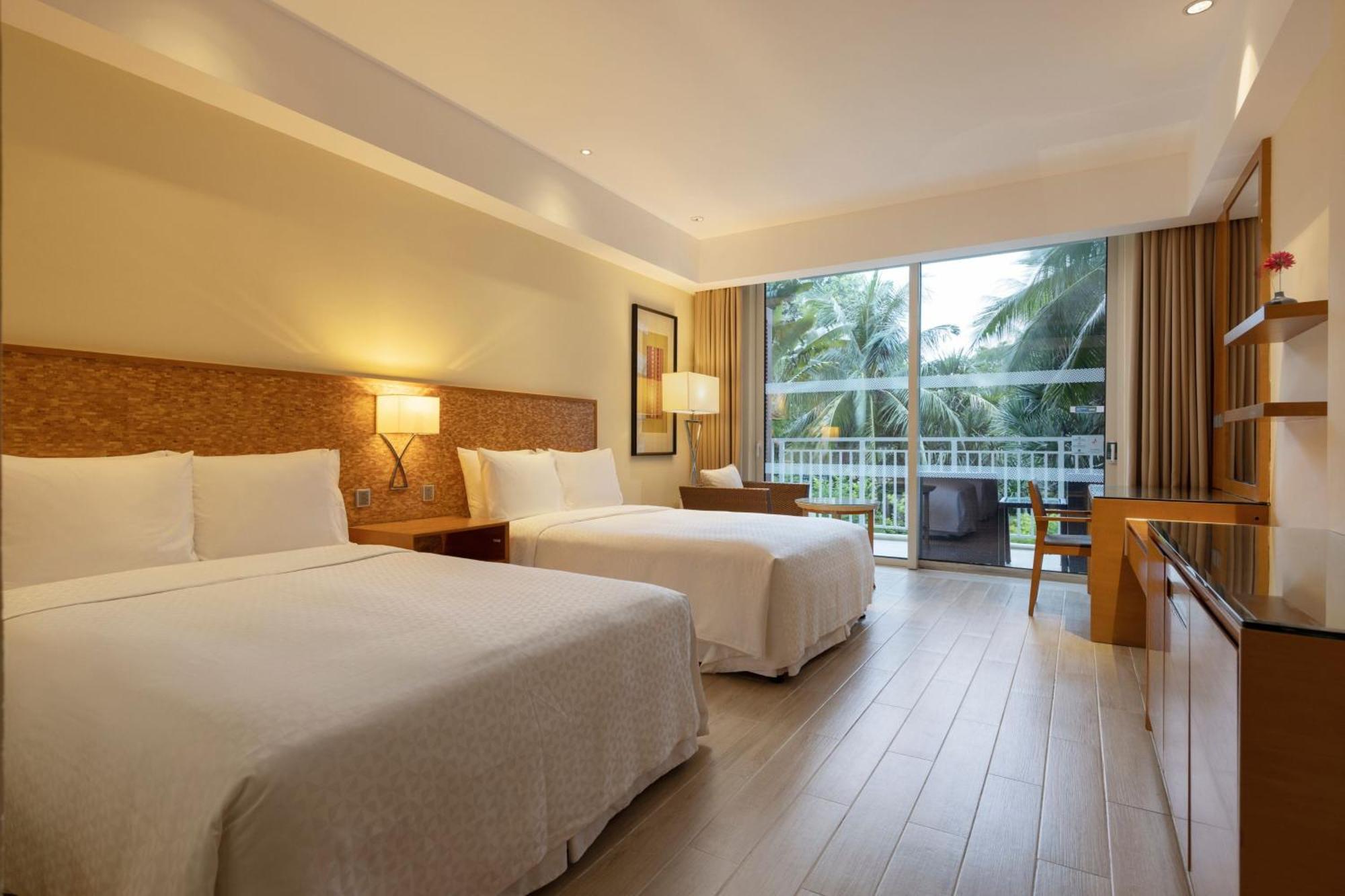 Four Points By Sheraton Shenzhou Peninsula Resort Wanning Exteriör bild