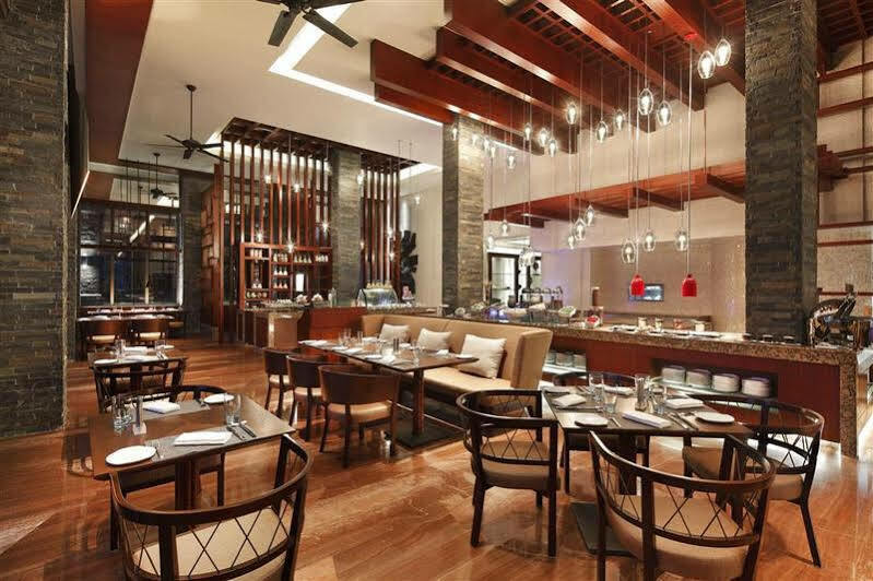 Four Points By Sheraton Shenzhou Peninsula Resort Wanning Exteriör bild